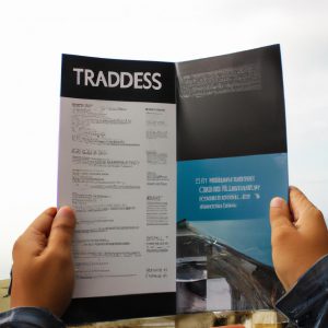 Person holding a travel itinerary